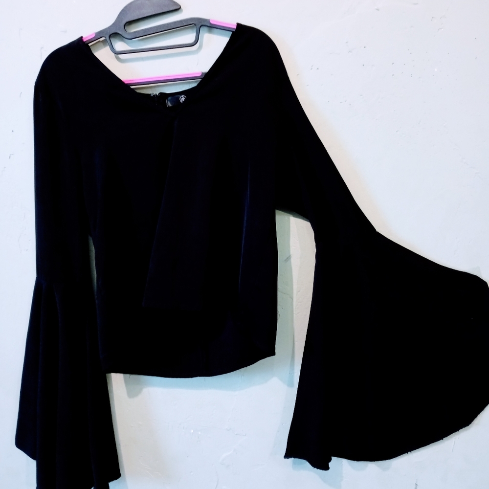 COPY - Black dramatic top. M brand. Size 10.